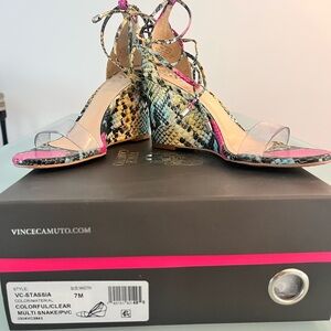 Vince Camuto Pink and Yellow Snake-Print Block Heel Sandals with Clear Strap.